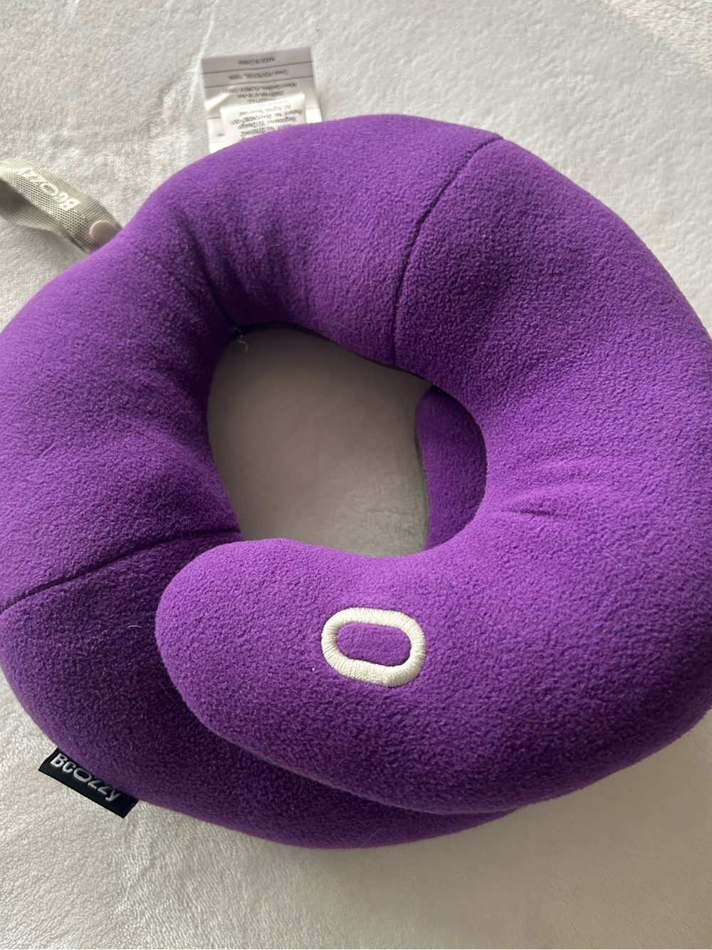 BCOZZY Purple Travel Neck Pillow with White 'O' Accent